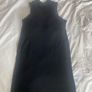 Klassy black sleeveless dress with builtin bra.